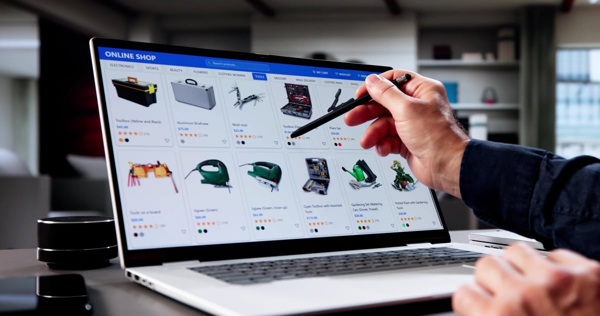 The Senior Consultant Uses His Laptop For Online Shopping